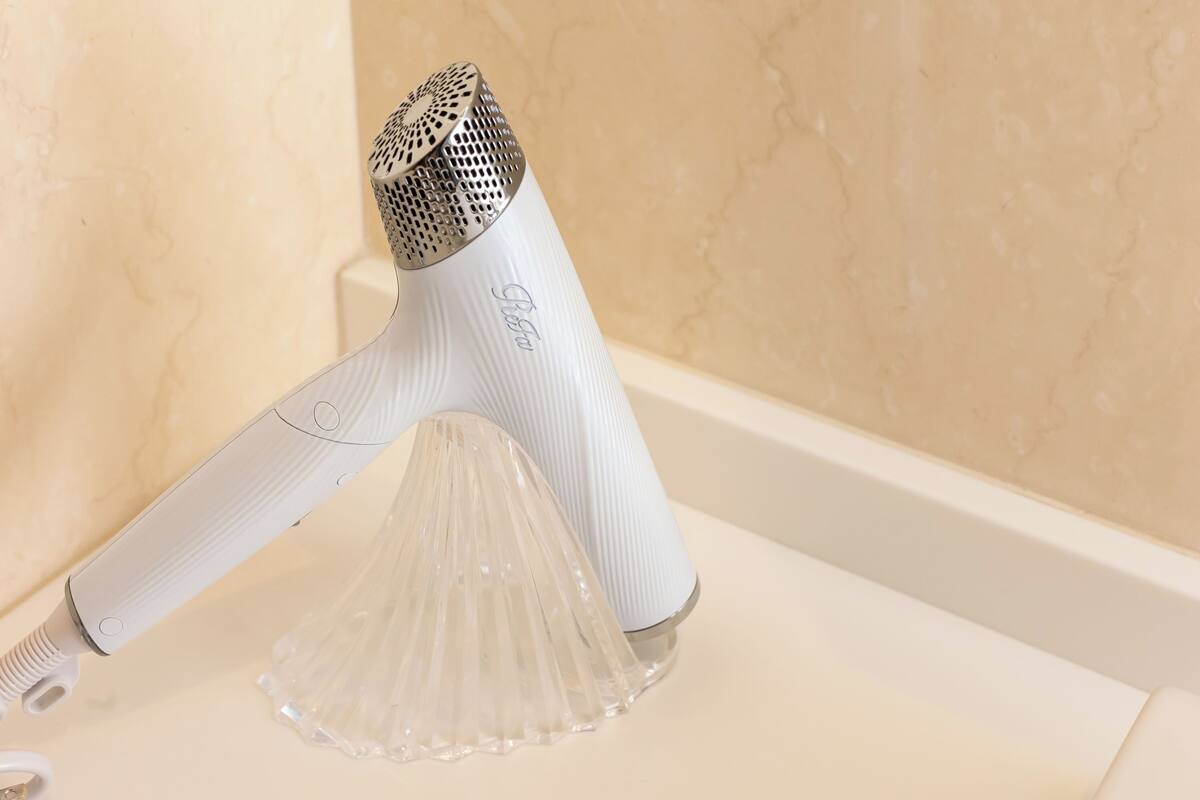 shower, free toiletries, hair dryer, slippers