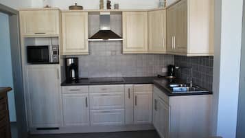 Family Apartment, 2 Bedrooms, Non Smoking, Corner | Private kitchen | Fridge, microwave, coffee/tea maker, electric kettle