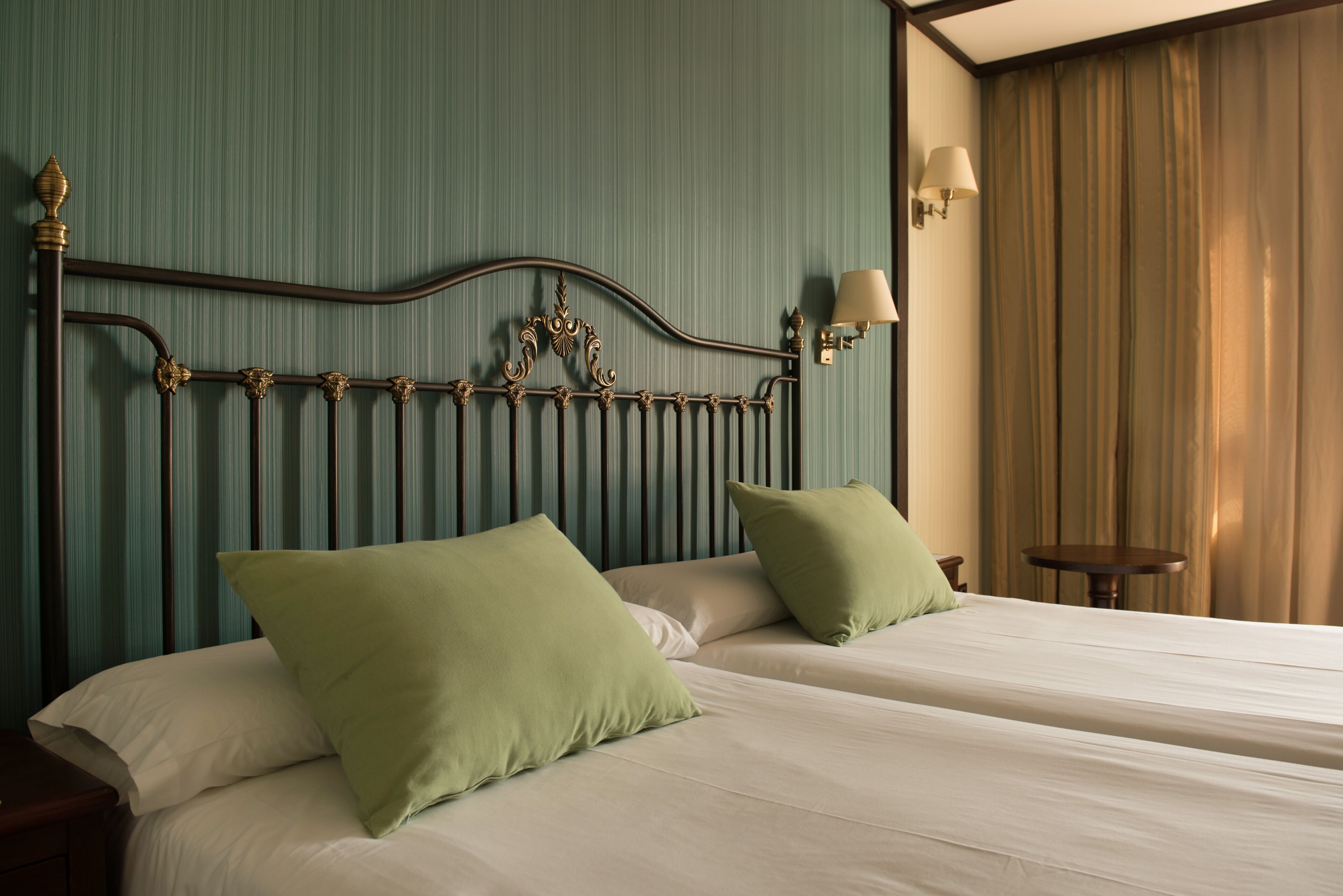 Standard Double Room | Minibar, in-room safe, desk, blackout drapes