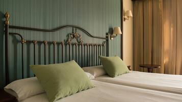 Standard Double Room | Minibar, in-room safe, desk, blackout drapes