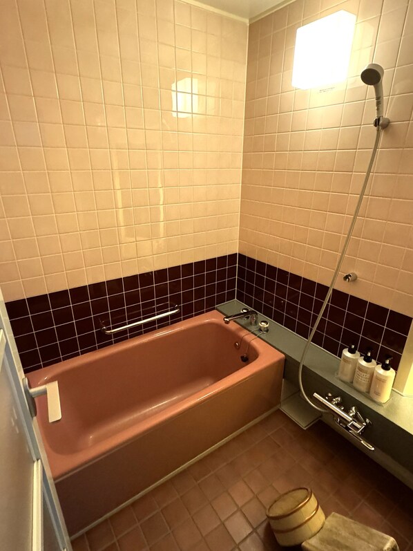 A bathroom with a bathtub, a shower, and a toilet. - Hagi No Yado Tomoe (Hagi)