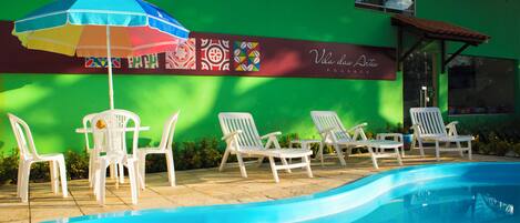 Outdoor pool, pool umbrellas, sun loungers