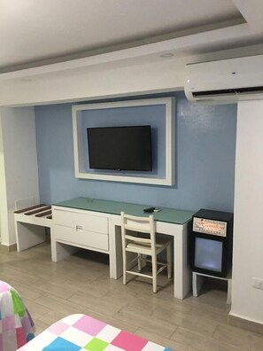 Minibar, safe på rommet, wi-fi (inkludert) og sengetøy