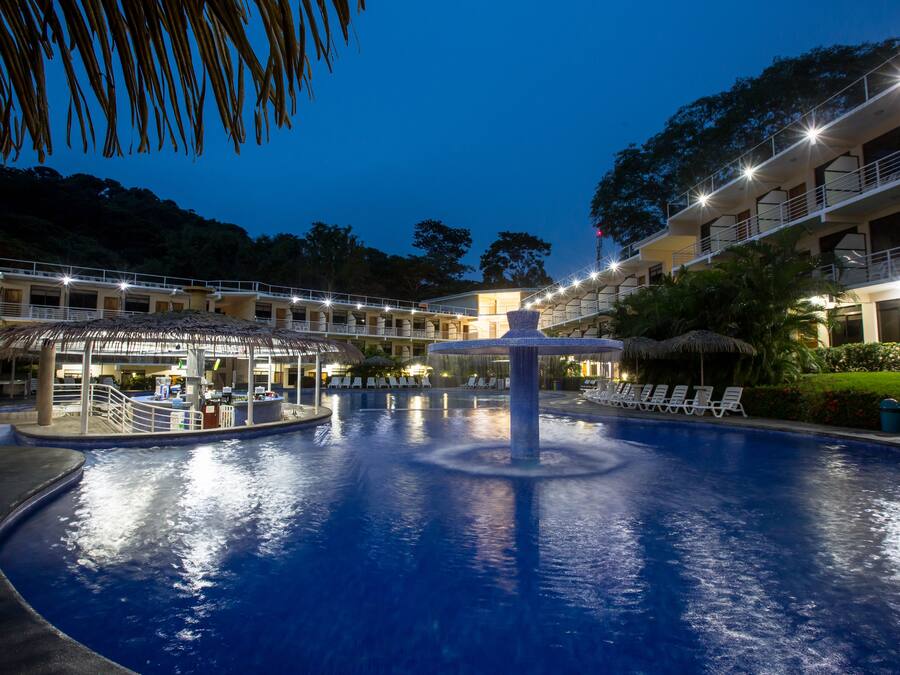 Outdoor pool, open 8:00 AM to 8:00 PM, pool umbrellas, pool loungers