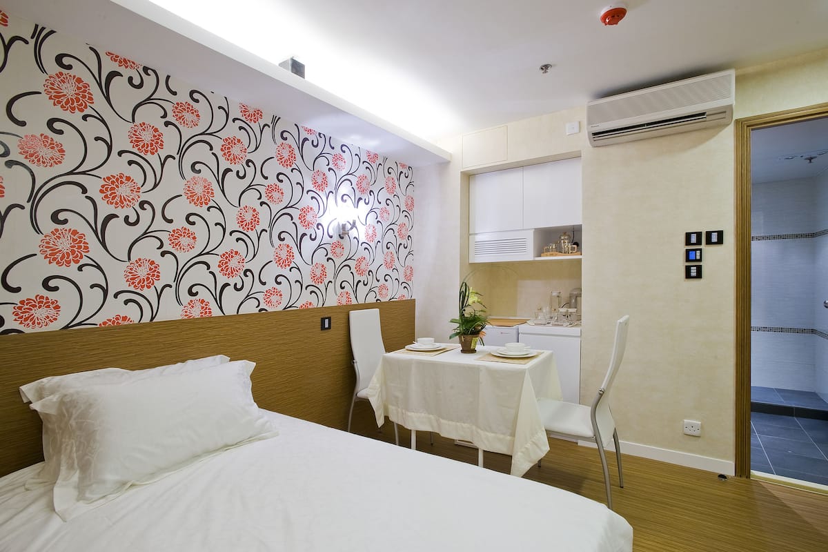 Deluxe Double Room | Minibar, in-room safe, desk, iron/ironing board