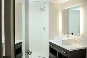Shower, rainfall showerhead, designer toiletries, hair dryer
