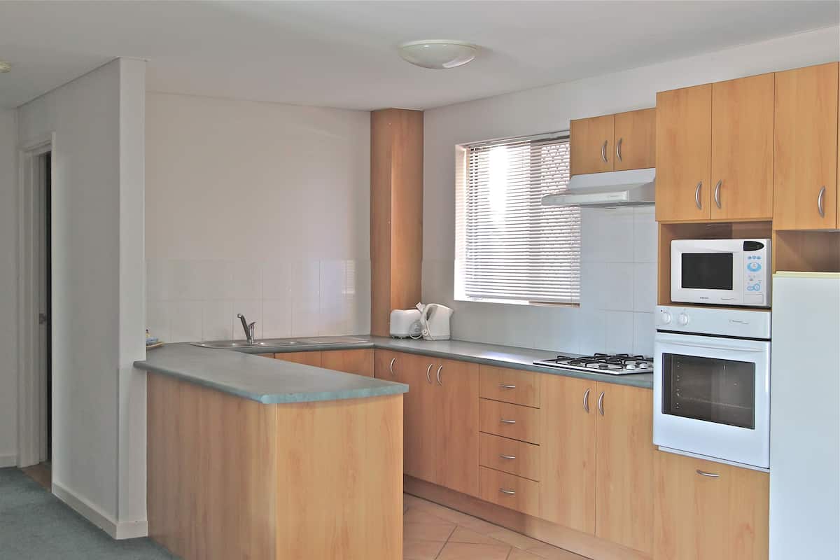 Two Bedroom Apartment | Private kitchen | Microwave, toaster