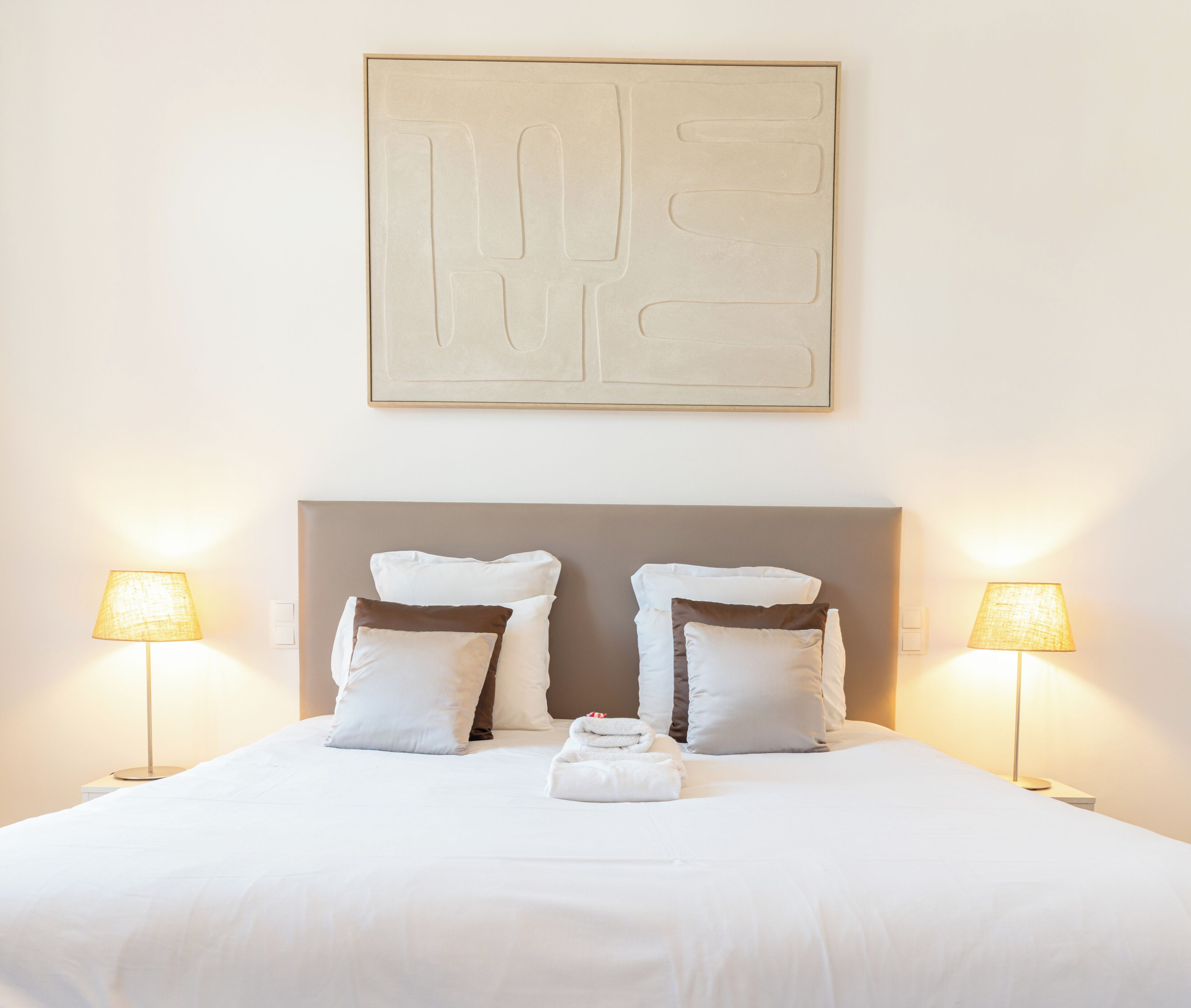 Junior Suite | Minibar, in-room safe, individually decorated, desk