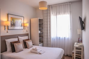 Standard Double Room | Minibar, in-room safe, individually decorated, desk