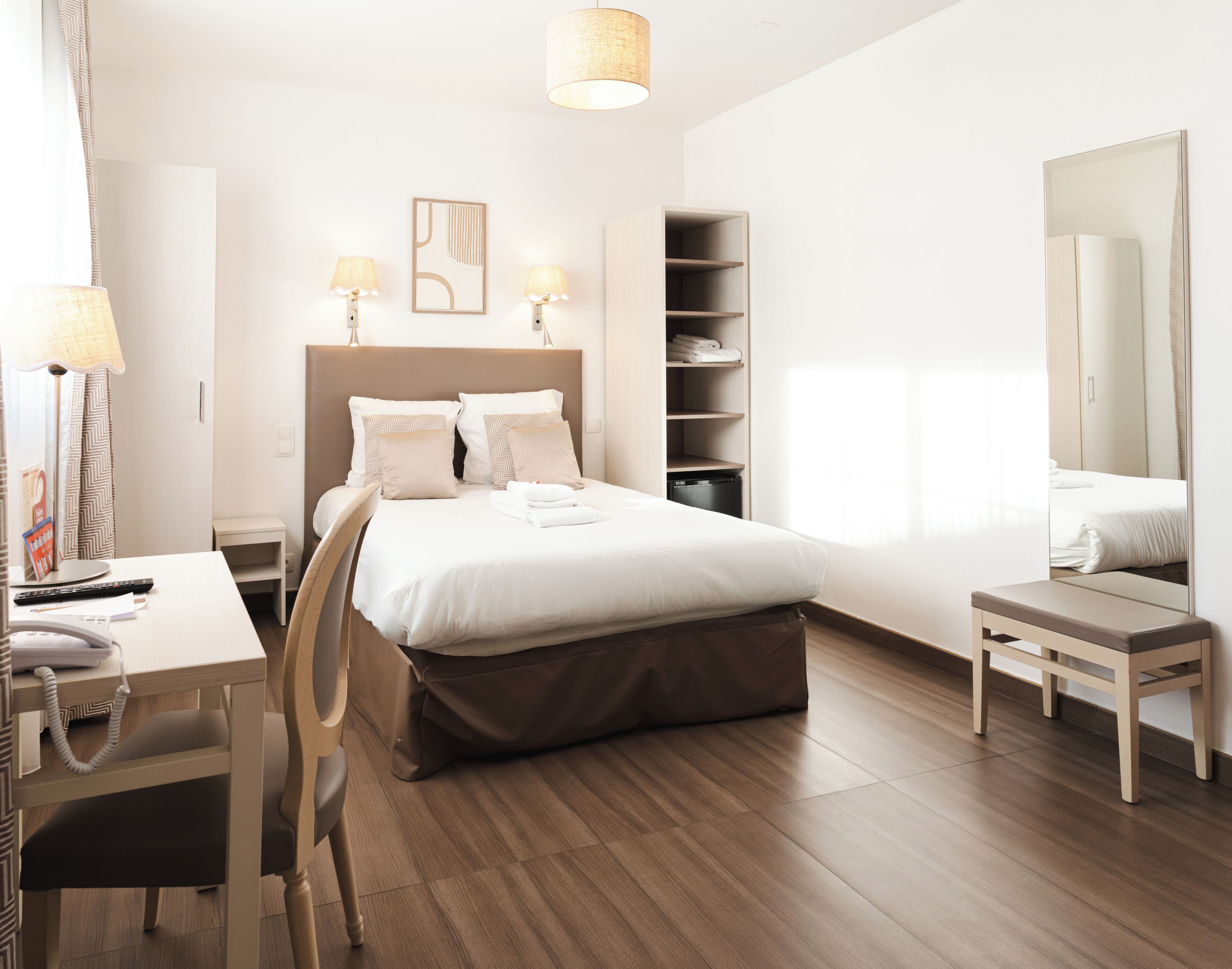 Standard Double Room | Minibar, in-room safe, individually decorated, desk