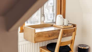 Desk, laptop workspace, free WiFi, bed sheets