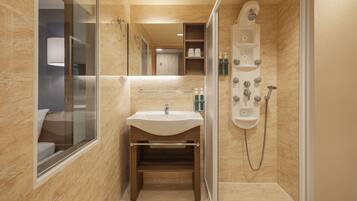 Habitación doble estándar | Baño | Regadera, regadera con hidromasaje, secadora de cabello, pantuflas