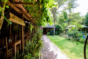Breakfast, lunch, dinner served; international cuisine, pool views 