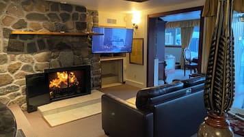 Presidential Suite, 1 Queen Bed, Lake View | Living area | 32-inch flat-screen TV with cable channels, TV, DVD player