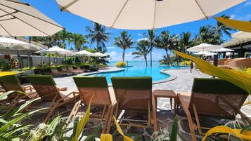 Outdoor pool, pool umbrellas, sun loungers