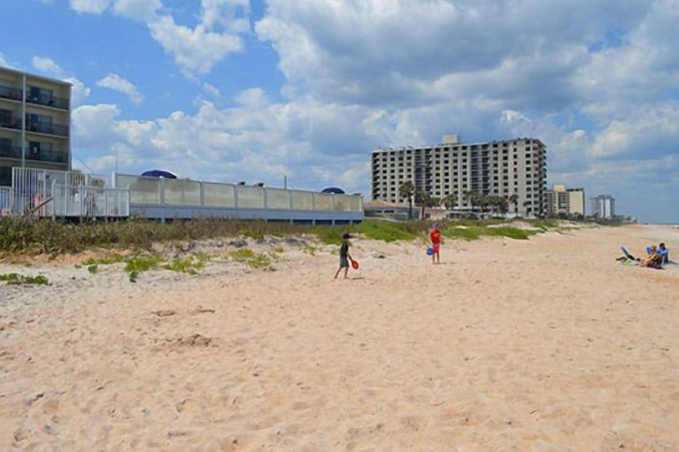 On the beach, sun-loungers, beach umbrellas, beach towels