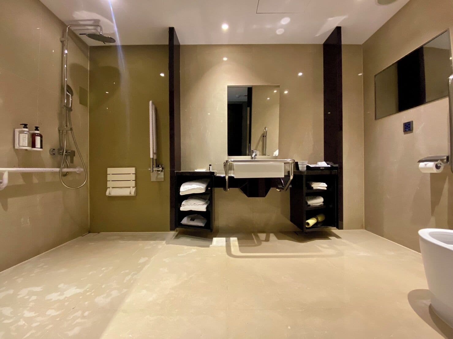 standard room - disability access | bathroom | eco-friendly toiletries, hair dryer, slippers, electronic bidet