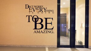 A motivational wall with the text "Don't worry. Every thing is going to be amazing." - Busan Amare Hotel (Busan)