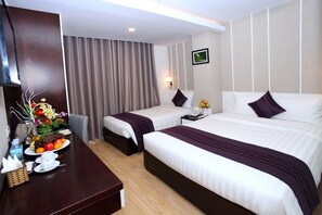 Superior Triple Room, Balcony | Minibar, in-room safe, desk, free WiFi
