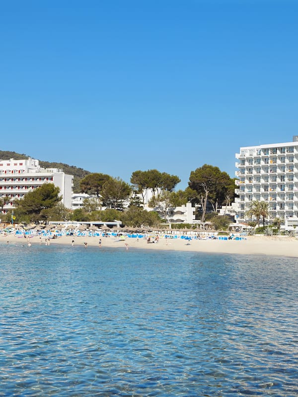 On the beach, sun-loungers, beach umbrellas, beach towels