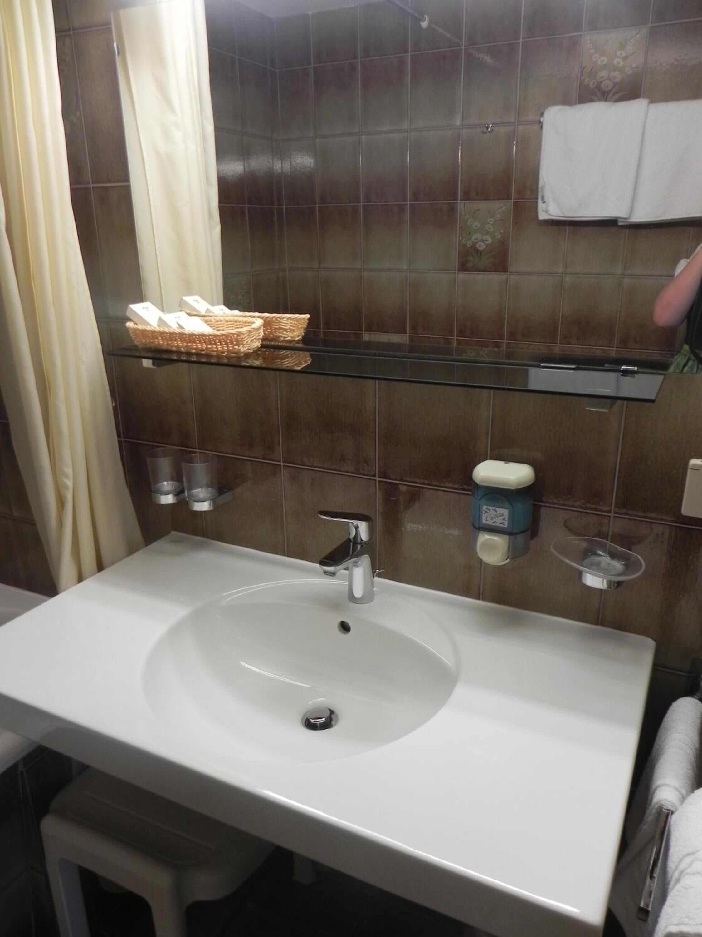 hair dryer, bathrobes, towels