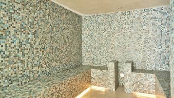 Experience the beauty of a mosaic tile design, featuring a textured pattern and bench for comfortable seating.