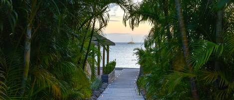 On the beach, white sand, free beach cabanas, sun-loungers