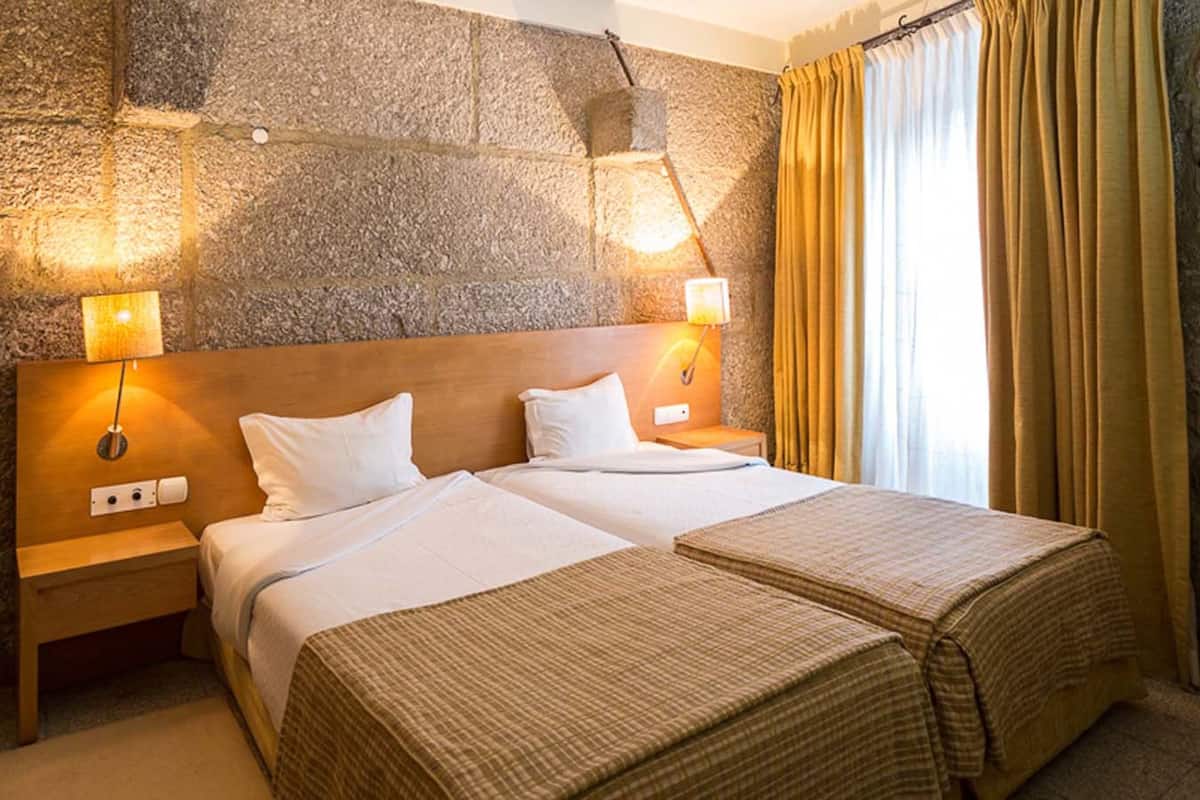 Laptop workspace, free WiFi, bed sheets