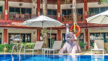 Outdoor pool, open 9 AM to 10 PM, pool umbrellas, pool loungers