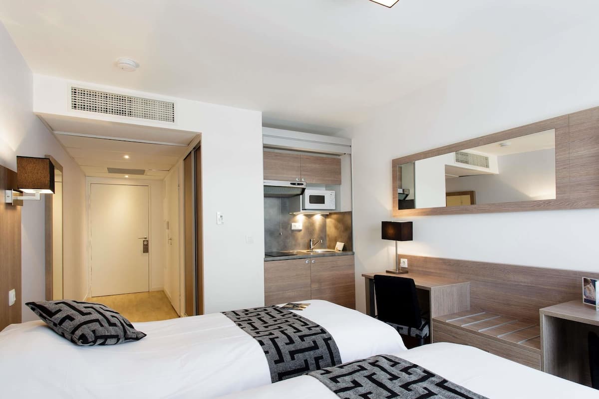Premium bedding, in-room safe, desk, soundproofing