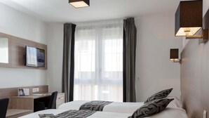 Studio, 2 Einzelbetten | Hochwertige Bettwaren, Zimmersafe, Schreibtisch, schallisolierte Zimmer