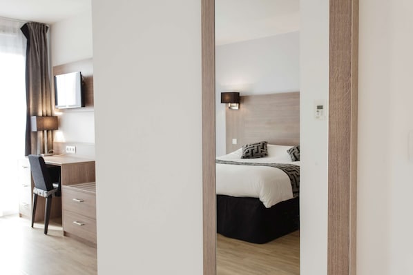 Premium bedding, in-room safe, desk, soundproofing