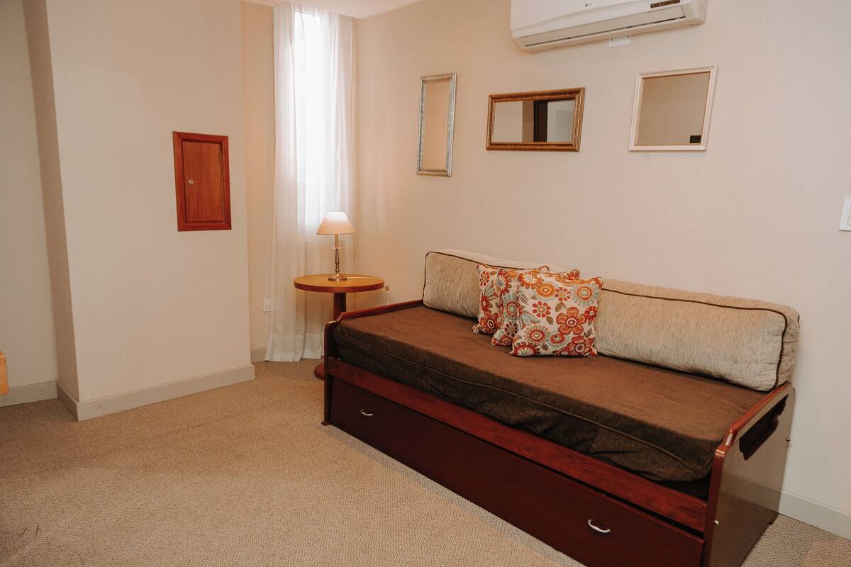 suite, 1 king bed, non smoking | minibar, in-room safe, desk, blackout curtains