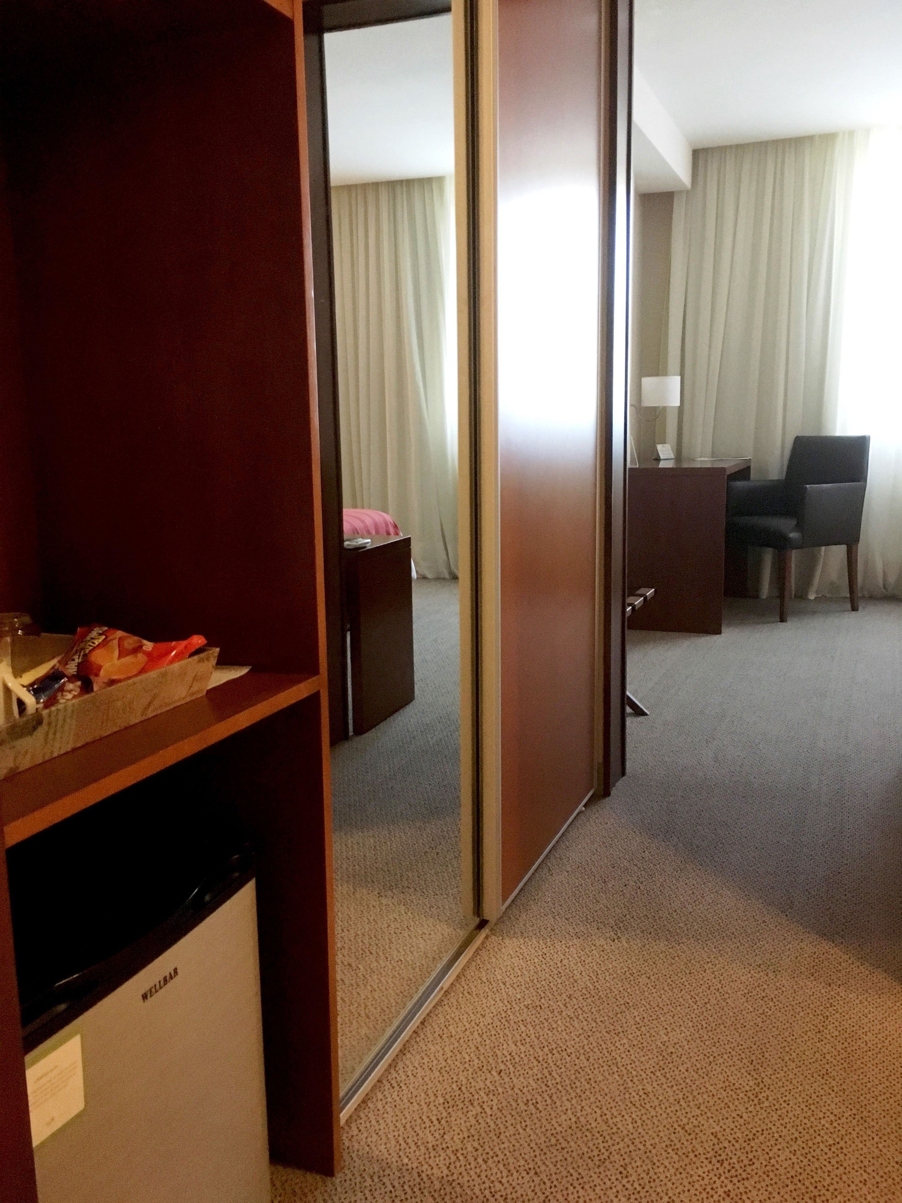 suite, 1 king bed, non smoking | minibar, in-room safe, desk, blackout curtains