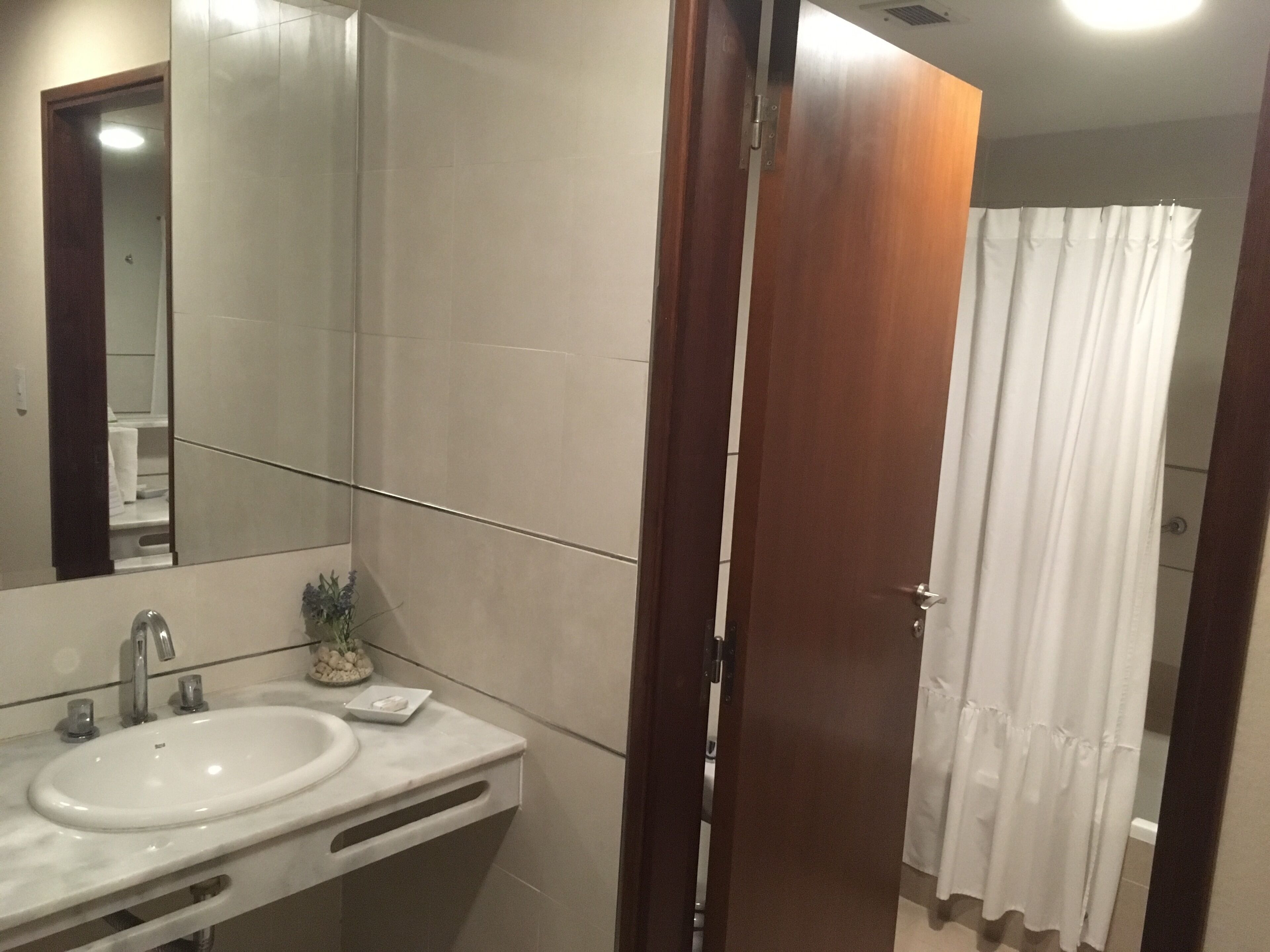 suite, 1 king bed, non smoking | minibar, in-room safe, desk, blackout curtains