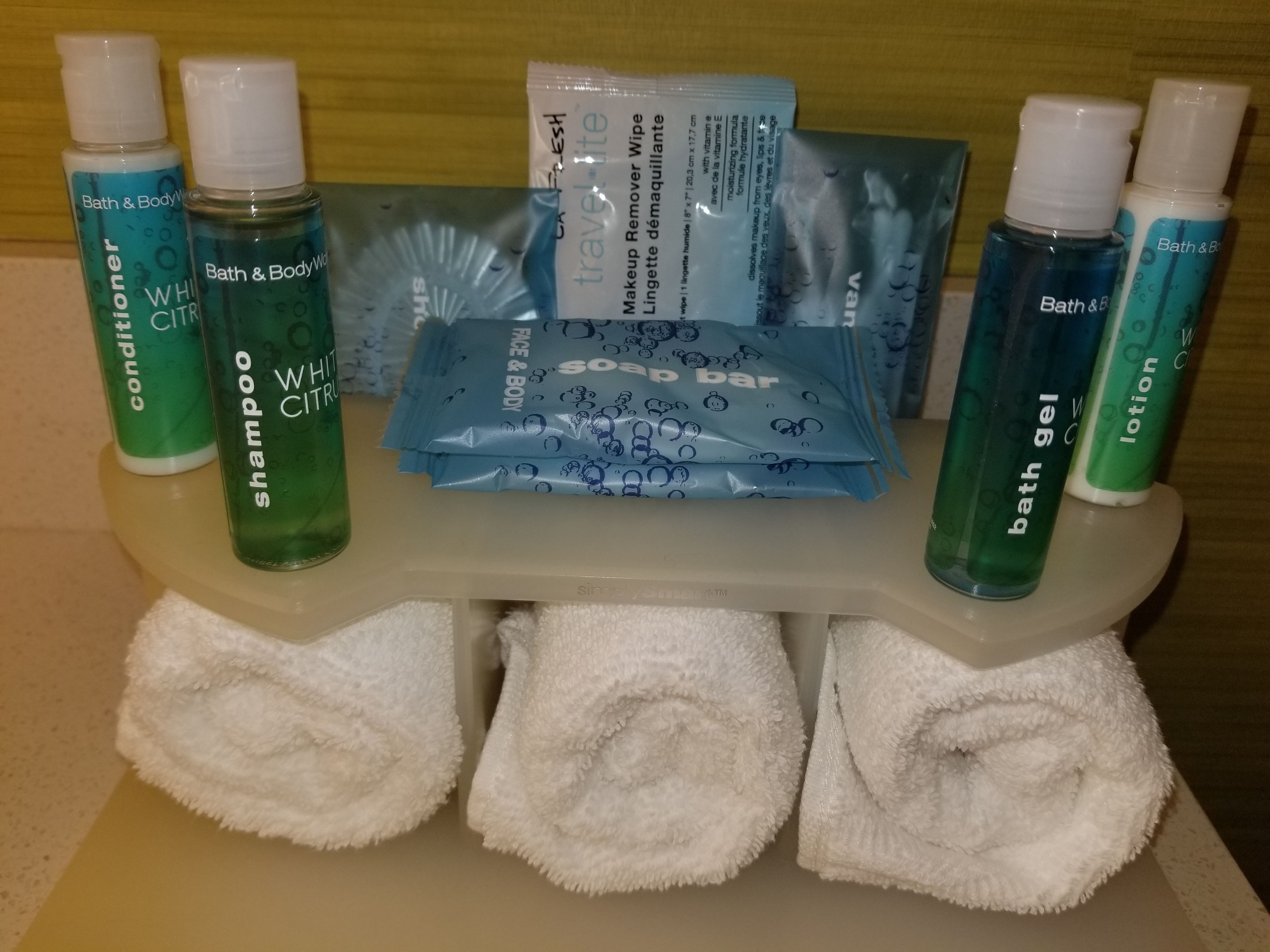 hair dryer, towels, soap, shampoo