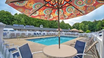 Seasonal outdoor pool, open 9:30 AM to 8:00 PM, pool umbrellas