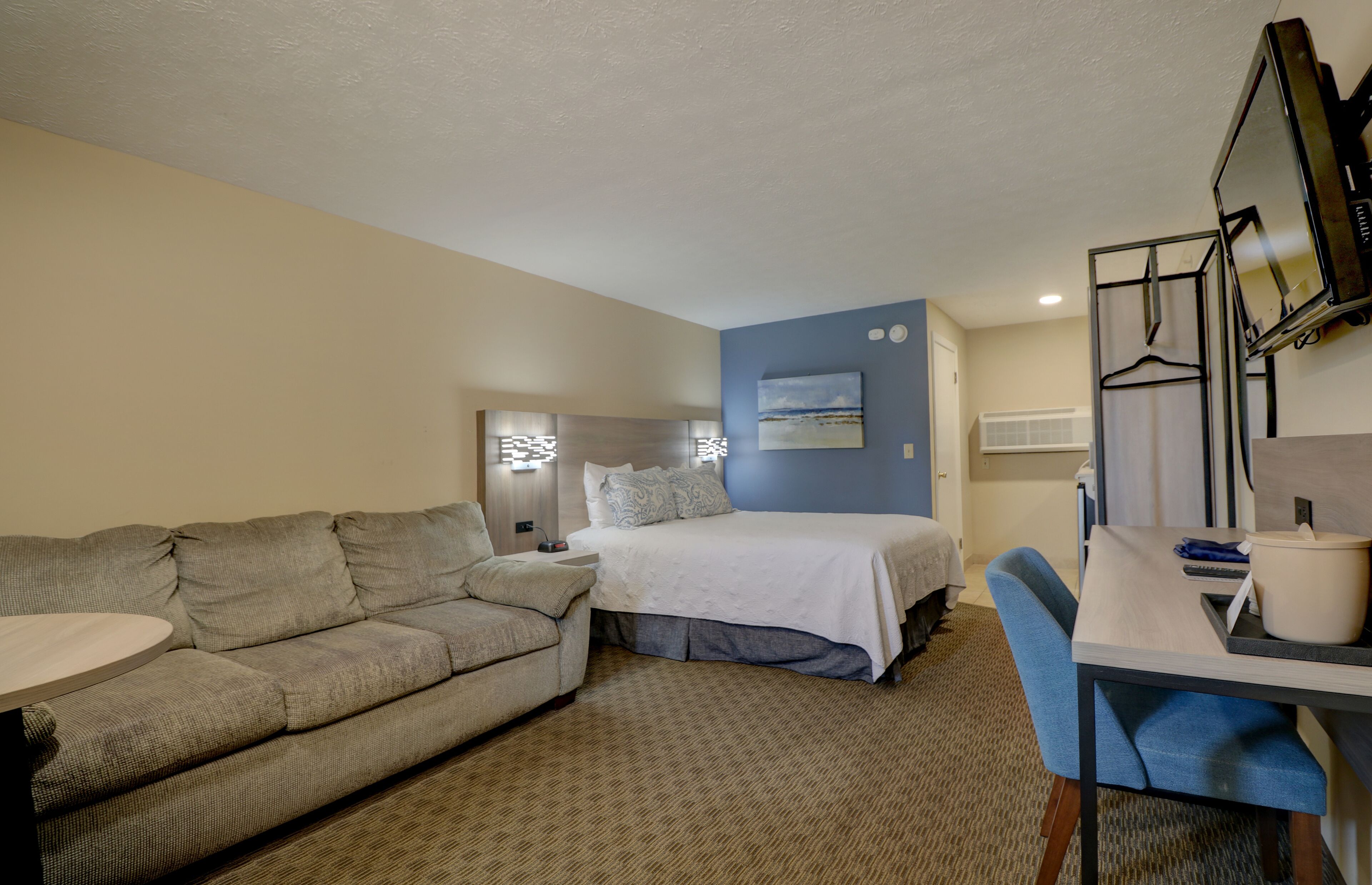 queen bed with sofa | 1 bedroom, individually decorated, individually furnished, desk