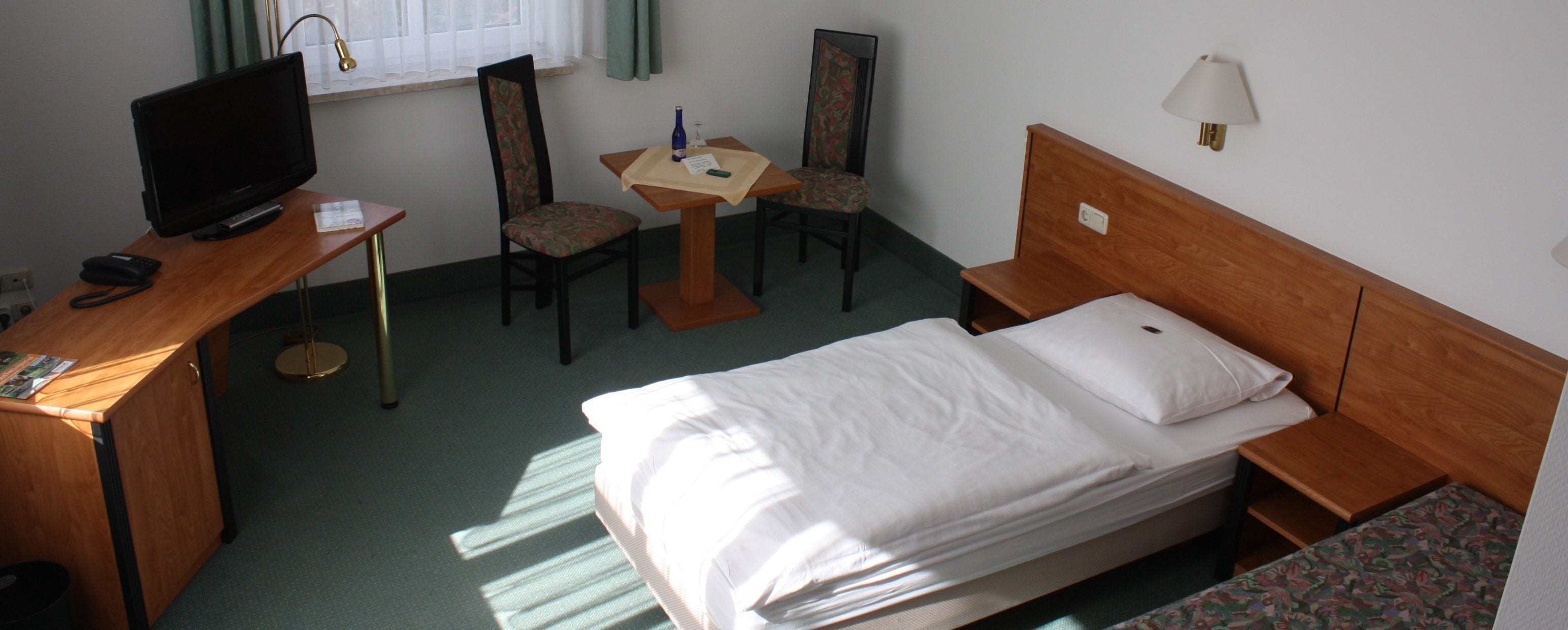 hypo-allergenic bedding, desk, free wifi, bed sheets