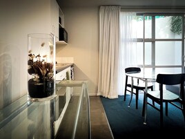 Executive Apartment, 1 Bedroom, Jetted Tub | Private kitchen | Fridge, microwave, coffee/tea maker, electric kettle