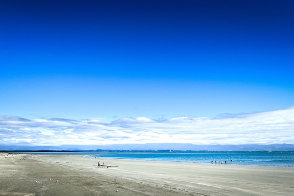 Nær stranden, strandhåndklær og roing