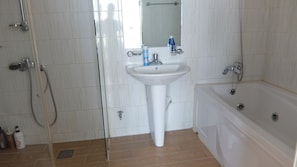 Premium Double Room | Bathroom | Separate tub and shower, deep soaking tub, hair dryer, bathrobes