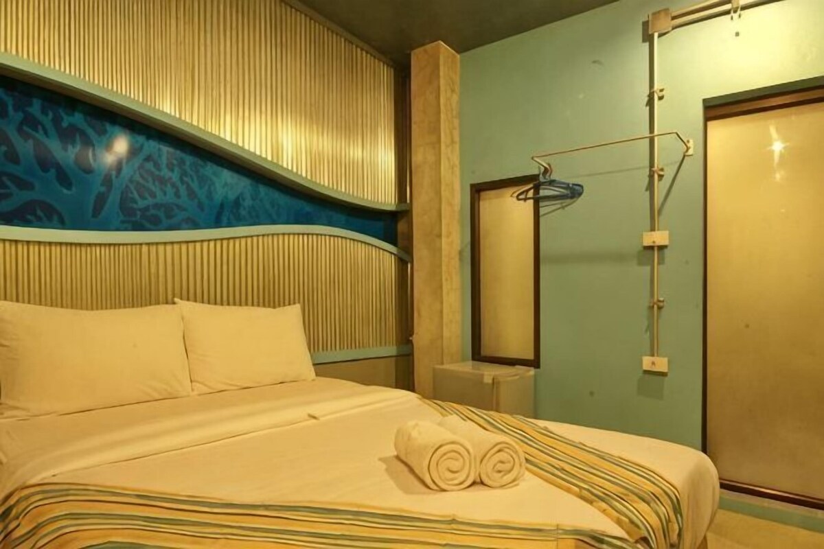 Premium bedding, pillow-top beds, blackout curtains, free WiFi