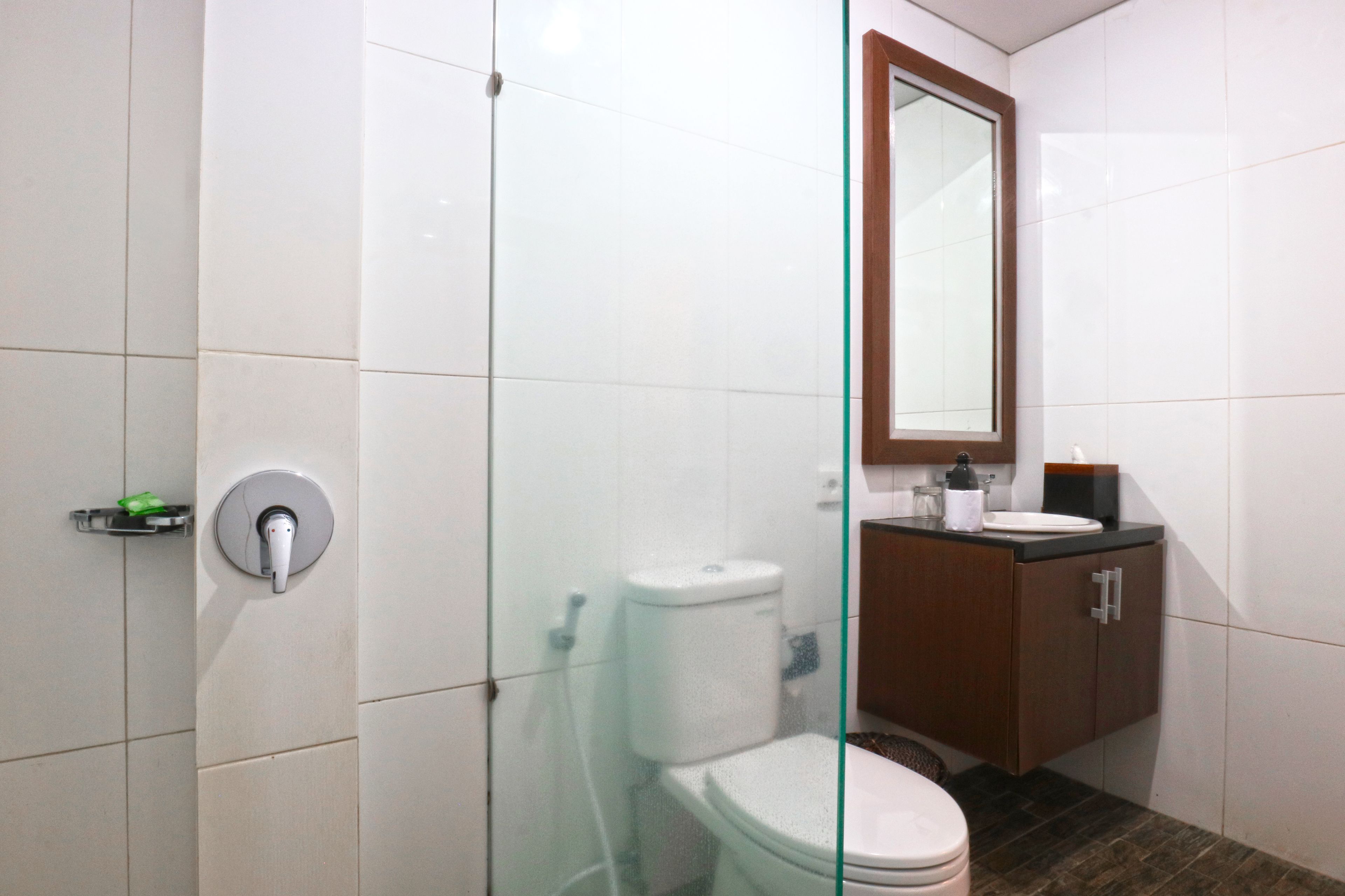 deluxe studio | bathroom | shower, bathrobes, slippers, towels
