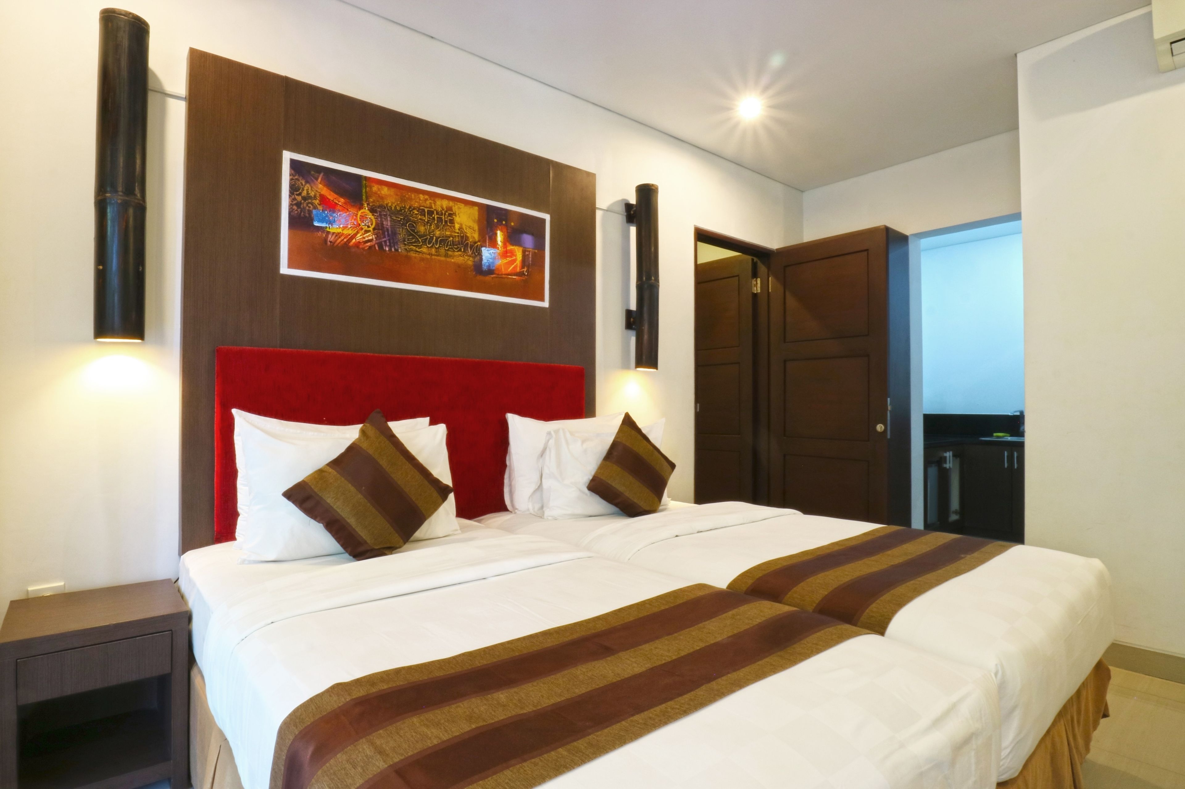 deluxe studio, connecting rooms | minibar, in-room safe, desk, free wifi