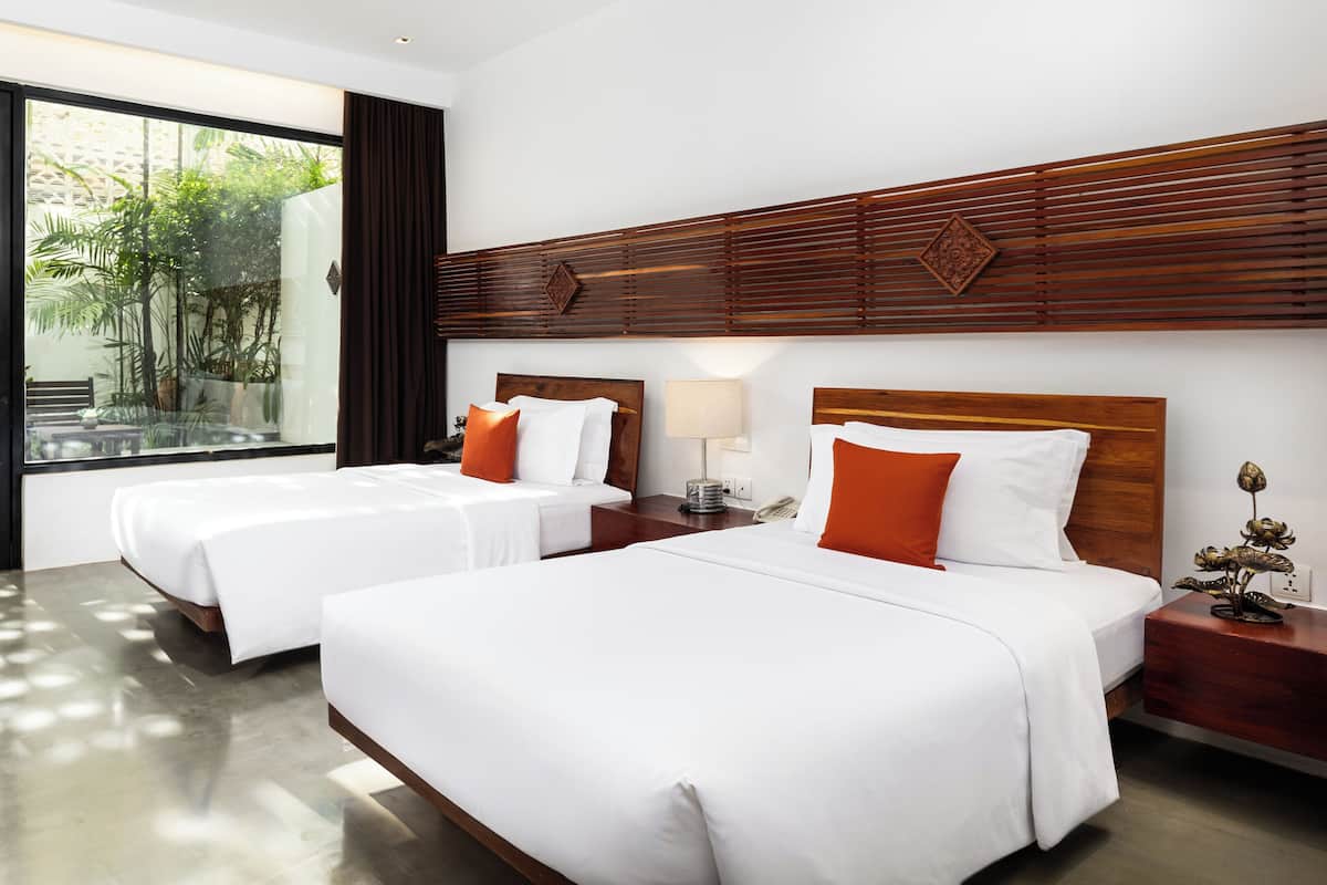 Deluxe Twin Private Garden | 1 bedroom, minibar, in-room safe, individually decorated