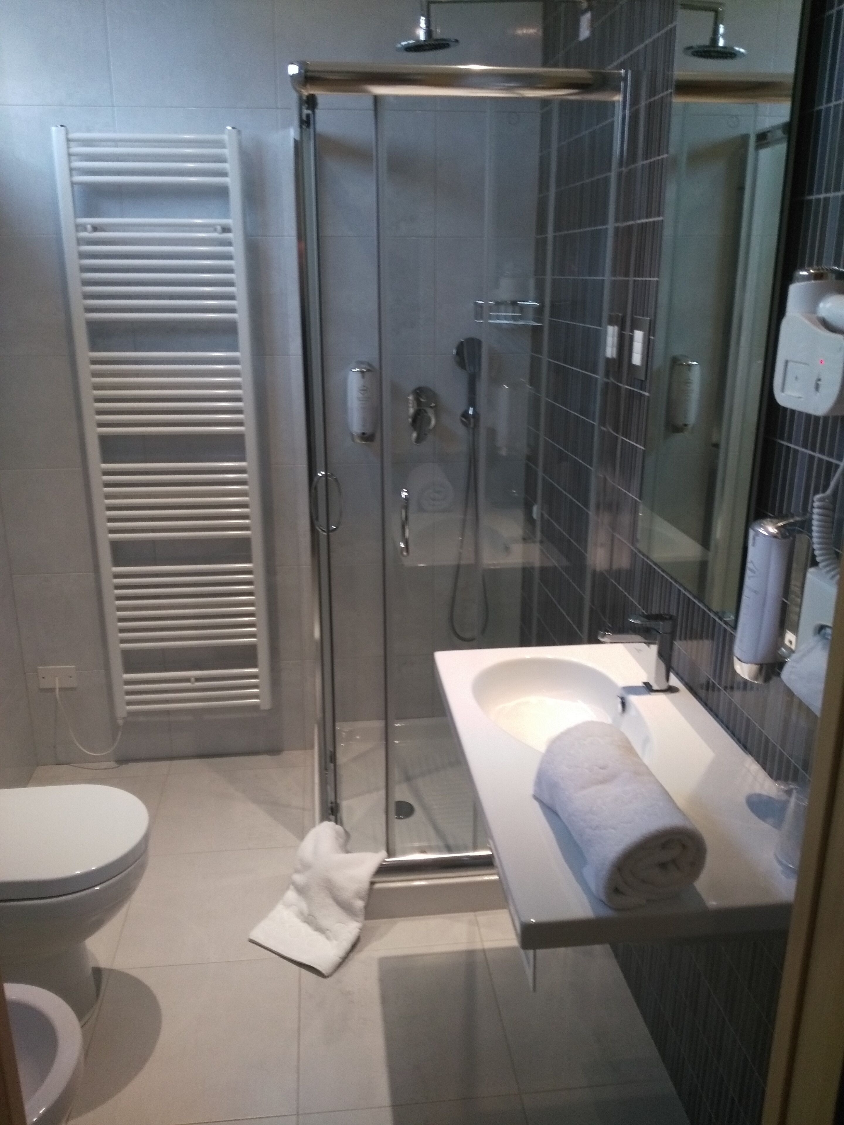 shower, free toiletries, hair dryer, slippers