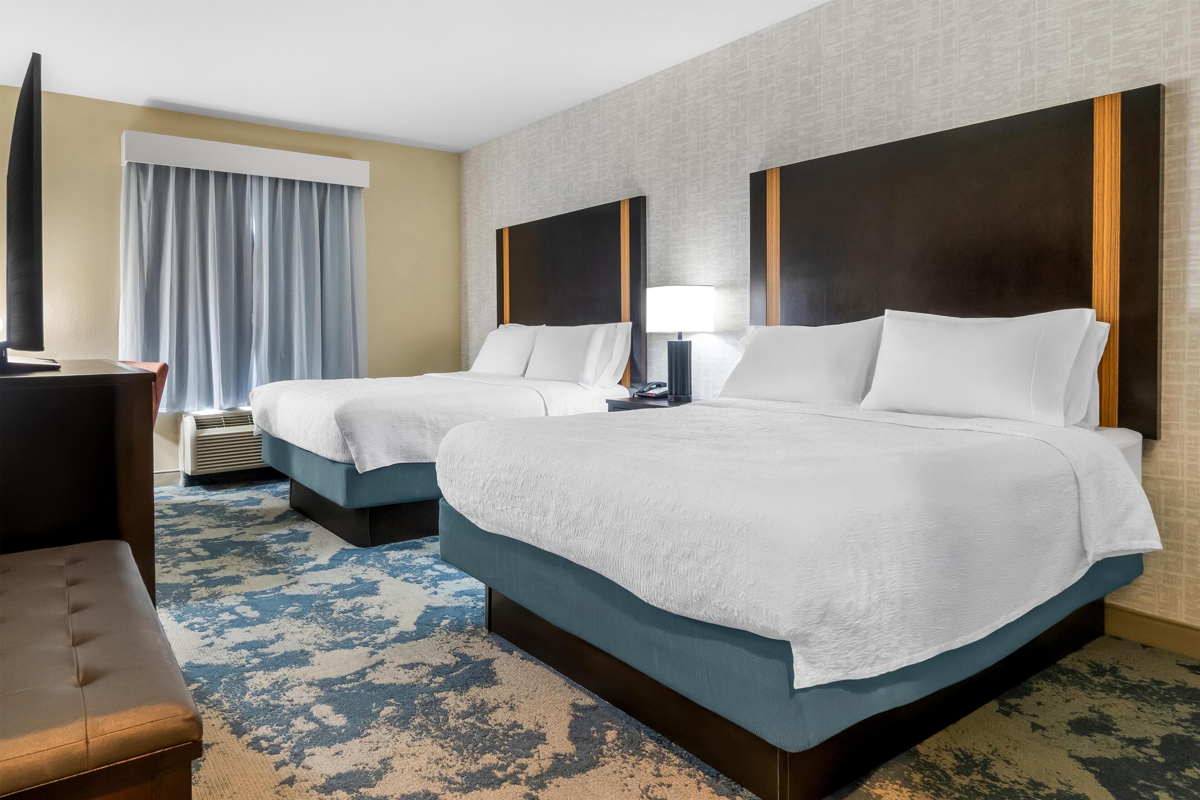 Room, 2 Queen Beds, Non Smoking, Refrigerator | In-room safe, iron/ironing board, free cribs/infant beds, free WiFi
