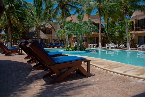 2 outdoor pools, open 8:00 AM to 9:00 PM, pool loungers