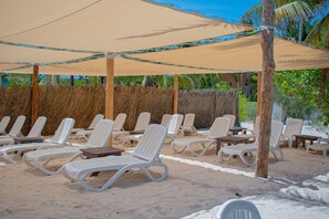 On the beach, free beach cabanas, sun-loungers, beach umbrellas